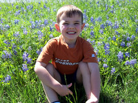 Portrait Photography - Youth in Blue Bonnet Field Dallas Texas