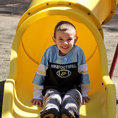 Portrait Photography - Youth on Slide